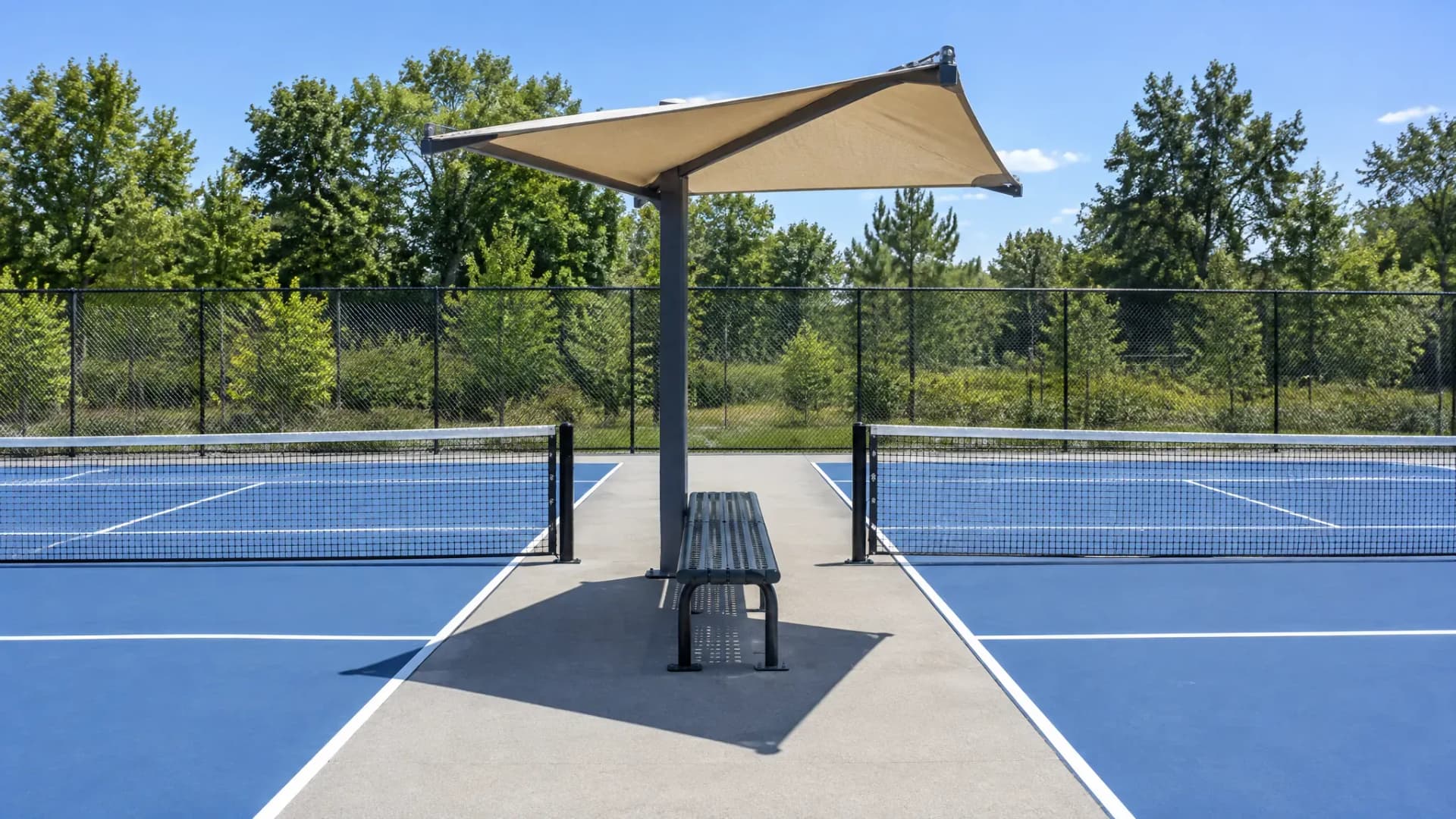Courtside Shade and Seating: Specifying Cabanas, Benches and Canopies That Survive Outdoors
